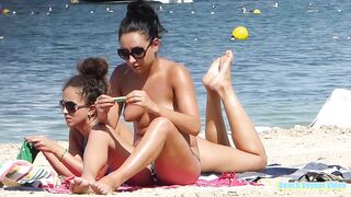 Hot Nudist Girl Topless showing boobs on nude beach 50