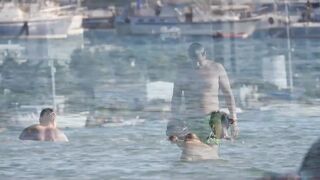 Hot Nudist Girl Topless showing boobs on nude beach 255