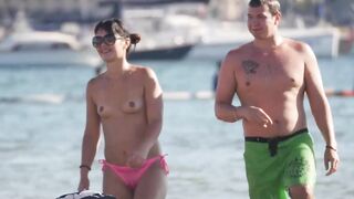 Hot Nudist Girl Topless showing boobs on nude beach 255