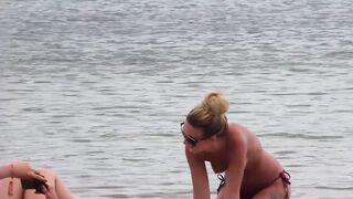 Hot Nudist Girl Topless showing boobs on nude beach 69