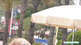 Hot Nudist Girl Topless showing boobs on nude beach 45