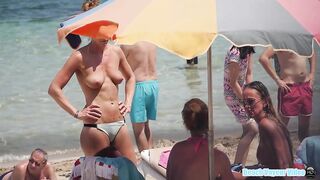 Hot Nudist Girl Topless showing boobs on nude beach 166