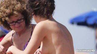 Hot Nudist Girl Topless showing boobs on nude beach 310