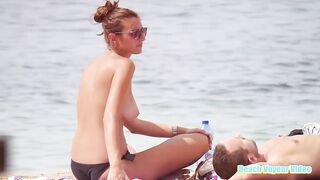 Hot Nudist Girl Topless showing boobs on nude beach 75
