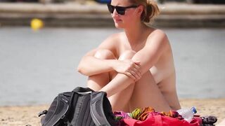 Hot Nudist Girl Topless showing boobs on nude beach 160