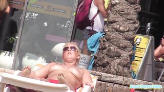 Hot Nudist Girl Topless showing boobs on nude beach 57