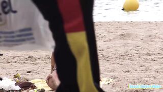 Hot Nudist Girl Topless showing boobs on nude beach 49