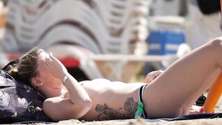 Hot Nudist Girl Topless showing boobs on nude beach 141