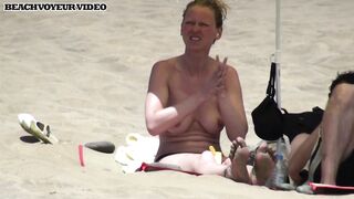 Hot Nudist Girl Topless showing boobs on nude beach 588