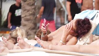 Hot Nudist Girl Topless showing boobs on nude beach 168