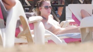 Hot Nudist Girl Topless showing boobs on nude beach 123