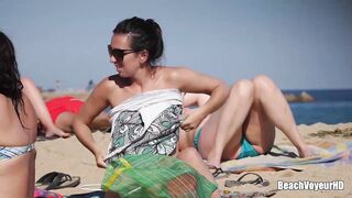 Hot Nudist Girl Topless showing boobs on nude beach 301