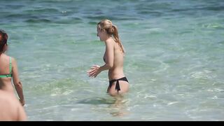 Hot Nudist Girl Topless showing boobs on nude beach 197