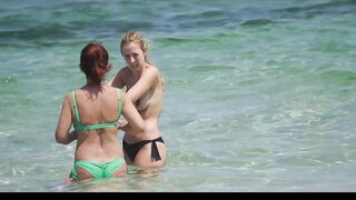 Hot Nudist Girl Topless showing boobs on nude beach 197