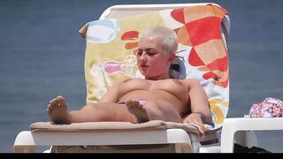 Hot Nudist Girl Topless showing boobs on nude beach 209