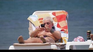 Hot Nudist Girl Topless showing boobs on nude beach 209