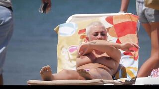 Hot Nudist Girl Topless showing boobs on nude beach 209