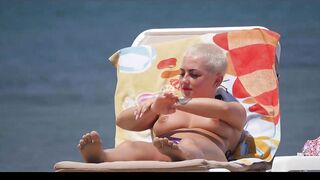 Hot Nudist Girl Topless showing boobs on nude beach 209