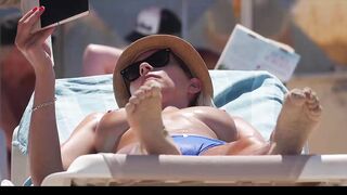 Hot Nudist Girl Topless showing boobs on nude beach 219