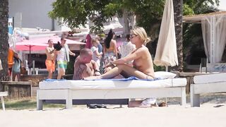 Hot Nudist Girl Topless showing boobs on nude beach 258