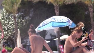 Hot Nudist Girl Topless showing boobs on nude beach 67