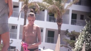 Hot Nudist Girl Topless showing boobs on nude beach 67