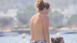 Hot Nudist Girl Topless showing boobs on nude beach 124