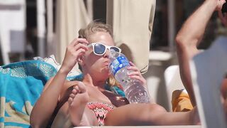 Hot Nudist Girl Topless showing boobs on nude beach 111