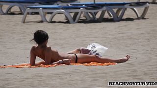 Hot Nudist Girl Topless showing boobs on nude beach 477