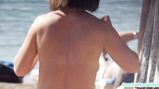 Hot Nudist Girl Topless showing boobs on nude beach 157