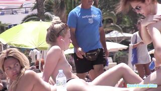 Hot Nudist Girl Topless showing boobs on nude beach 47