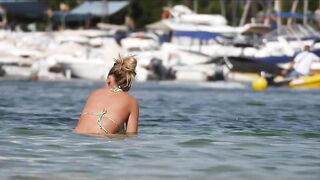 Hot Nudist Girl Topless showing boobs on nude beach 179