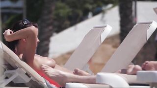 Hot Nudist Girl Topless showing boobs on nude beach 242