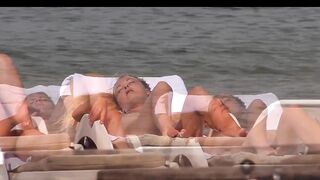 Hot Nudist Girl Topless showing boobs on nude beach 208