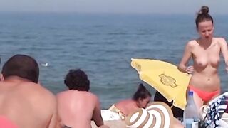 Hot Nudist Girl Topless showing boobs on nude beach 413