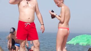 Hot Nudist Girl Topless showing boobs on nude beach 413