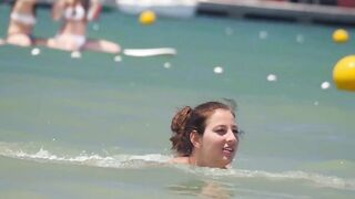 Hot Nudist Girl Topless showing boobs on nude beach 237