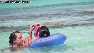 Hot Nudist Girl Topless showing boobs on nude beach 582