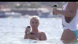 Hot Nudist Girl Topless showing boobs on nude beach 175