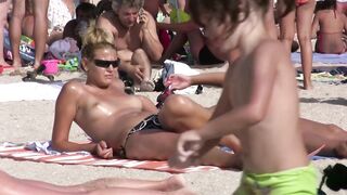 Hot Nudist Girl Topless showing boobs on nude beach 447