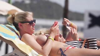 Hot Nudist Girl Topless showing boobs on nude beach 140