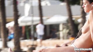 Hot Nudist Girl Topless showing boobs on nude beach 308