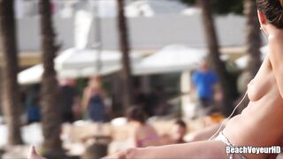 Hot Nudist Girl Topless showing boobs on nude beach 308