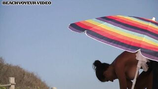 Hot Nudist Girl Topless showing boobs on nude beach 601