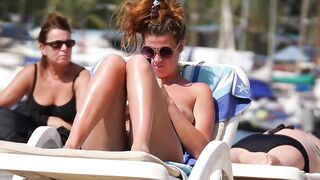 Hot Nudist Girl Topless showing boobs on nude beach 107