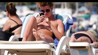 Hot Nudist Girl Topless showing boobs on nude beach 107