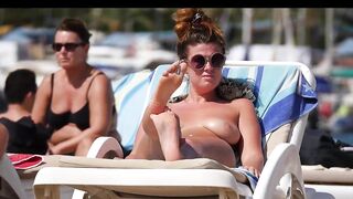 Hot Nudist Girl Topless showing boobs on nude beach 107