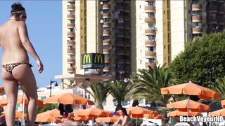 Hot Nudist Girl Topless showing boobs on nude beach 294