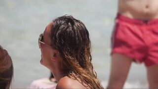 Hot Nudist Girl Topless showing boobs on nude beach 245