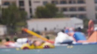 Hot Nudist Girl Topless showing boobs on nude beach 247